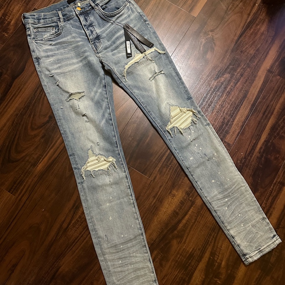 AMIRI Light Blue Distressed Skinny Jeans